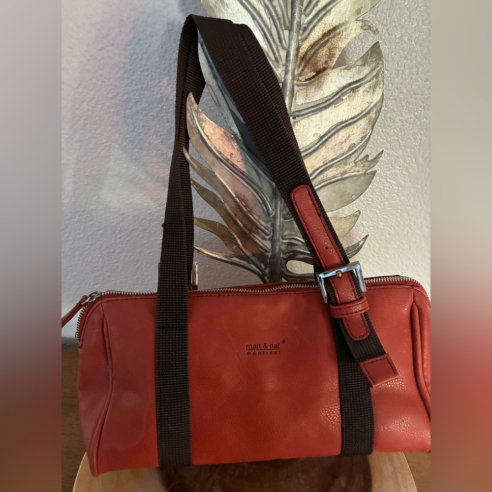 Matt & Nat Montreal 
Vegan leather bag/purse
Burnt Orange